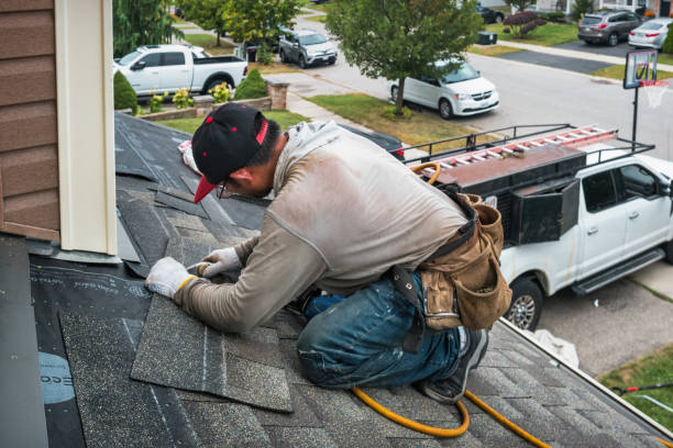 Professional Roofing technician working in Livingston, WI